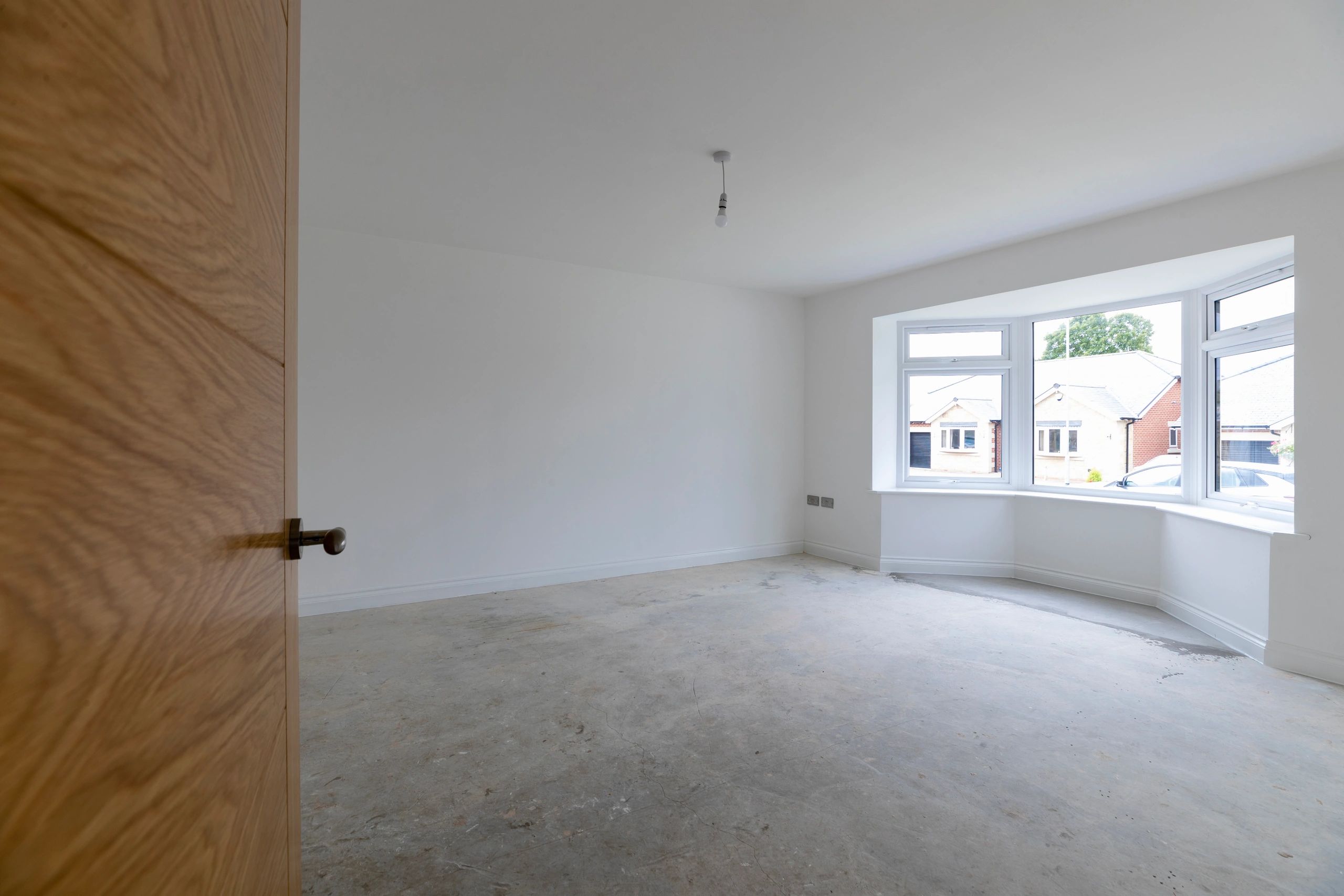 Room under renovation with concrete floor